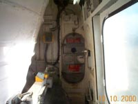 Access to the aftermost electronics bay, just to the side of the port air inlet above the lift-fan